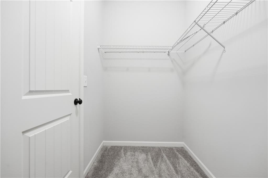 3244 Hawthorne Path Braselton, GA 30517 - Photo 37 of 48 a view of small space with empty racks