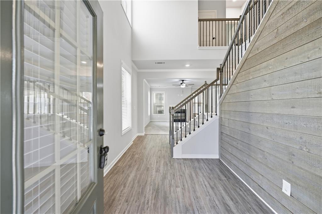 3244 Hawthorne Path Braselton, GA 30517 - Photo 4 of 48 a view of entryway with wooden floor