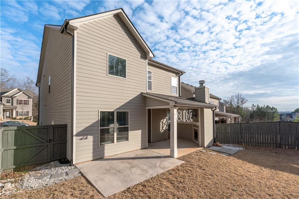 3244 Hawthorne Path Braselton, GA 30517 - Photo 43 of 48 a view of a house with a backyard