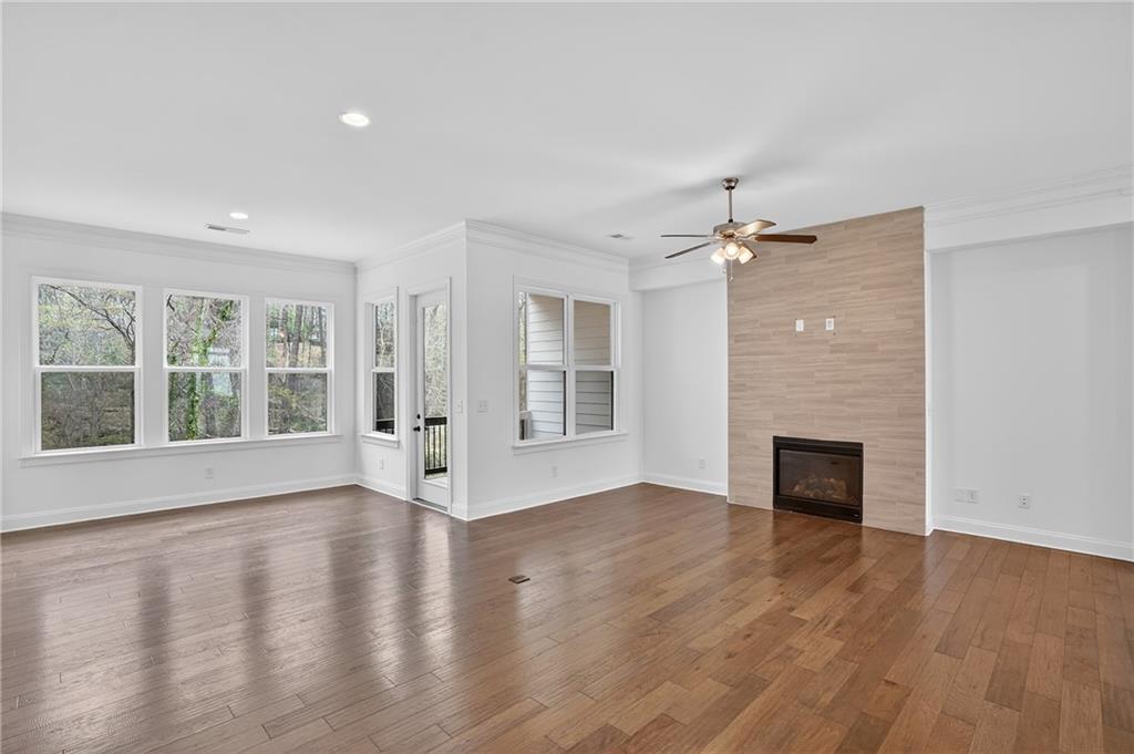 2341 Medlock Lane Decatur, GA 30033 - Photo 13 of 37 wooden floor in an empty room with a fireplace