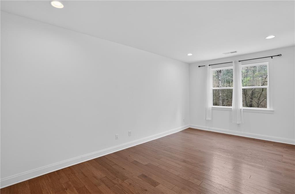 2341 Medlock Lane Decatur, GA 30033 - Photo 20 of 37 wooden floor in an empty room with a window