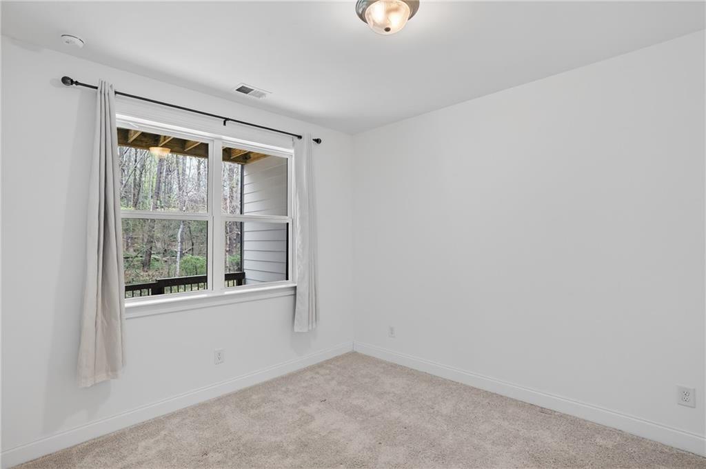 2341 Medlock Lane Decatur, GA 30033 - Photo 21 of 37 an empty room with a window