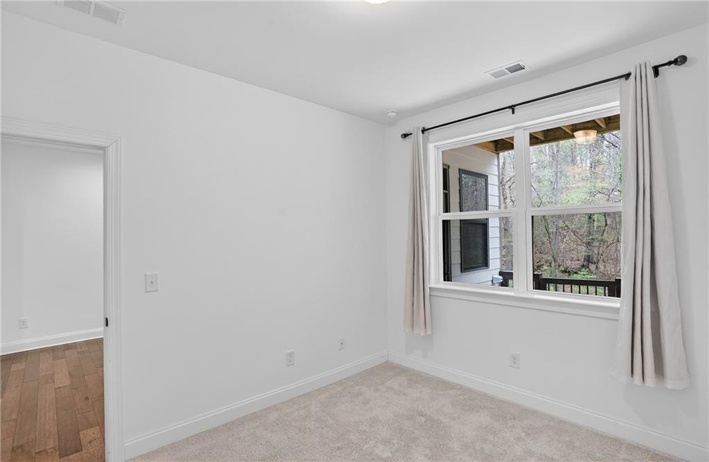 2341 Medlock Lane Decatur, GA 30033 - Photo 22 of 37 an empty room with a window