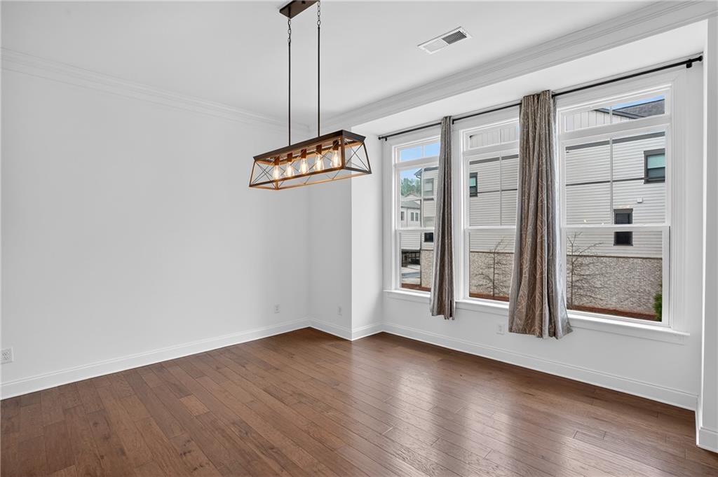 2341 Medlock Lane Decatur, GA 30033 - Photo 6 of 37 a view of an empty room with a window