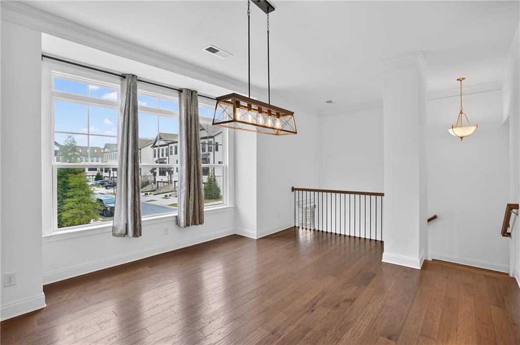 2341 Medlock Lane Decatur, GA 30033 - Photo 7 of 37 a view of a room with wooden floor and balcony