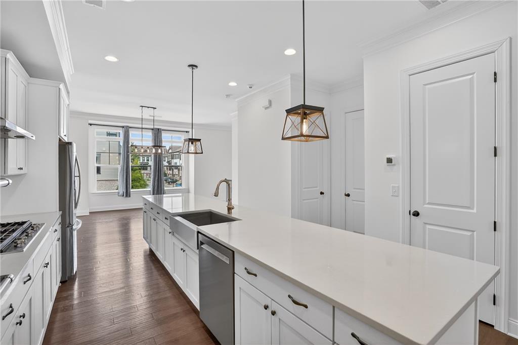 2341 Medlock Lane Decatur, GA 30033 - Photo 10 of 37 a kitchen with counter top space and wooden floor
