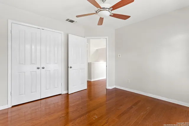 a view of workspace with wooden floor