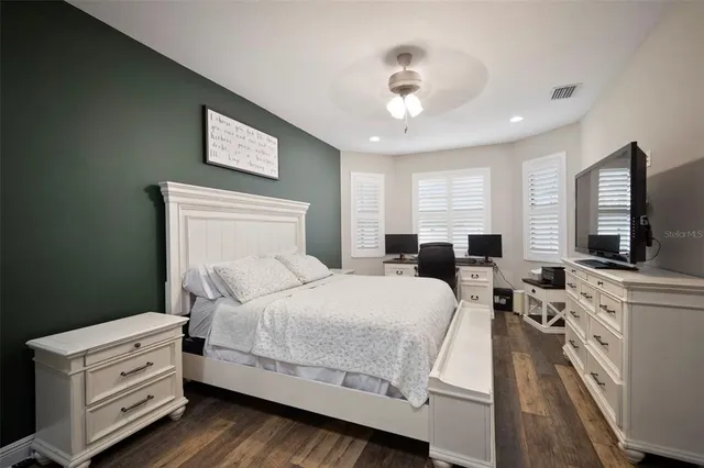 a room with furniture a piano and wooden floor