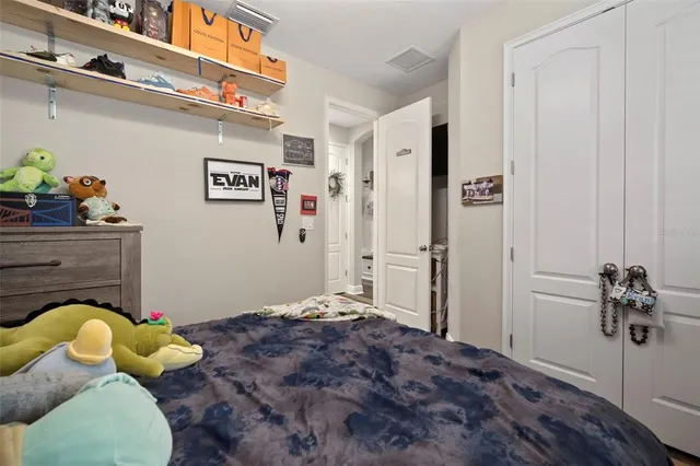 an aerial view of a house with a swimming pool