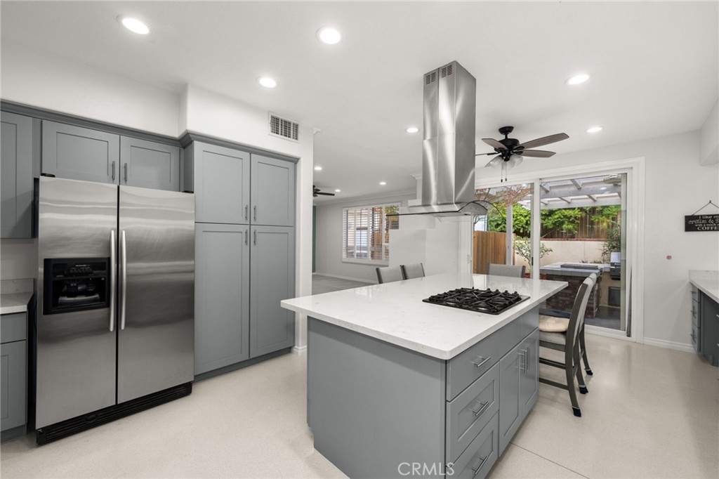 1015 La Salle Circle Corona, CA 92879 - Photo 14 of 56 a kitchen with a table and chairs