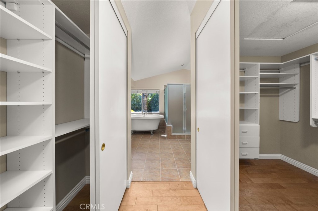 1015 La Salle Circle Corona, CA 92879 - Photo 30 of 56 a view of a hallway with wooden shelves