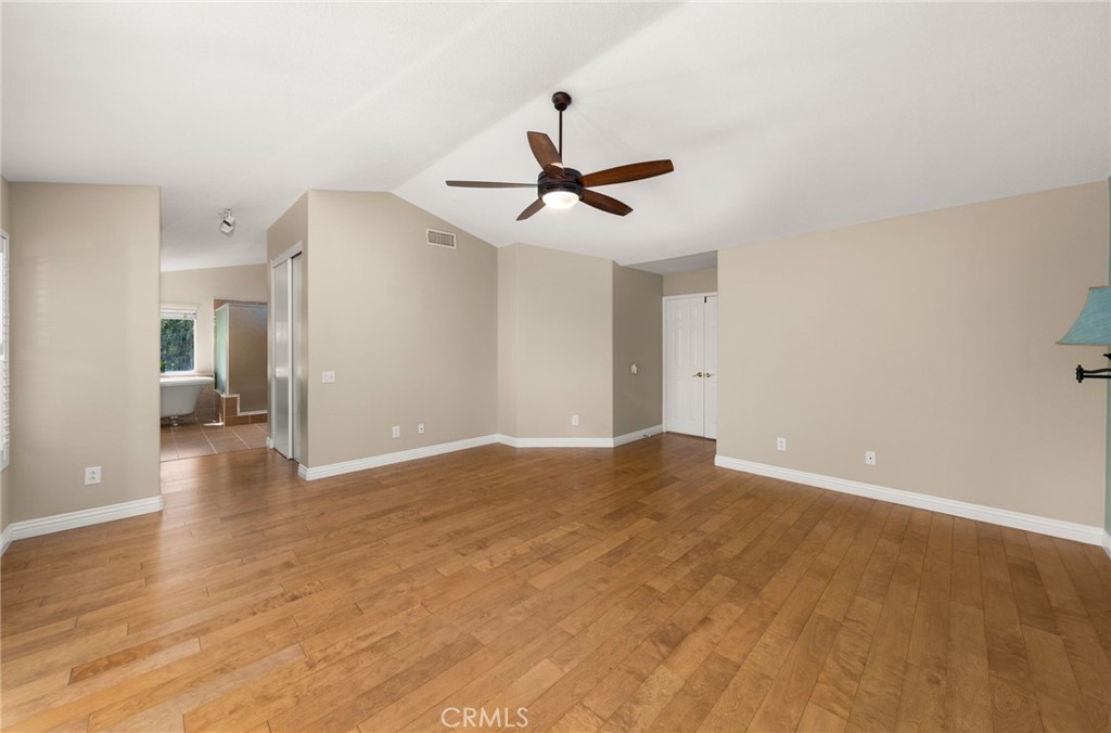 1015 La Salle Circle Corona, CA 92879 - Photo 34 of 56 a view of empty room with wooden floor