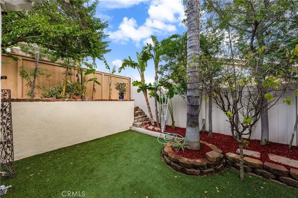 1015 La Salle Circle Corona, CA 92879 - Photo 41 of 56 a backyard of a house with lots of green space