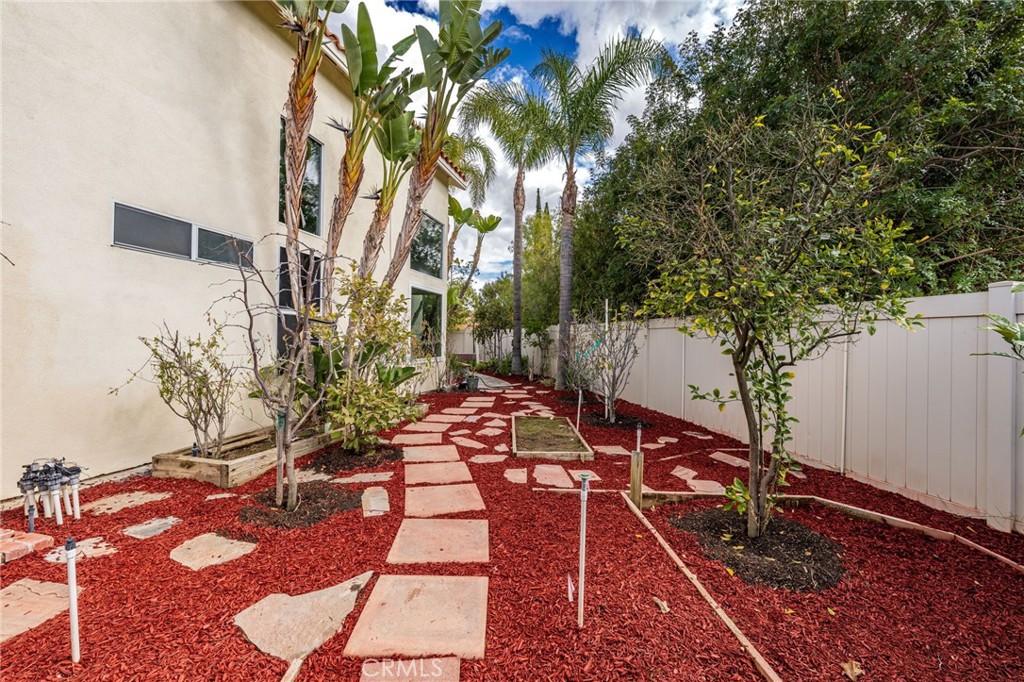1015 La Salle Circle Corona, CA 92879 - Photo 49 of 56 a backyard of a house with table and chairs