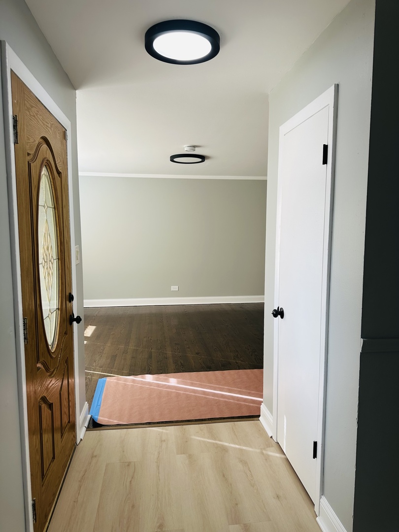 Undisclosed Address Glenwood, IL 60425 - Photo 4 of 17 a bedroom with a bed and a mirror