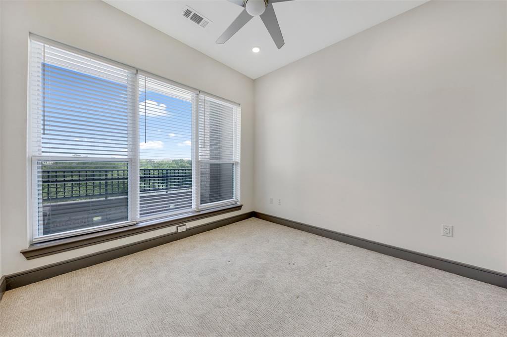 2700 Old Denton Road, Unit 2236 Carrollton, TX 75007 - Photo 15 of 28 a view of room with floor to ceiling window