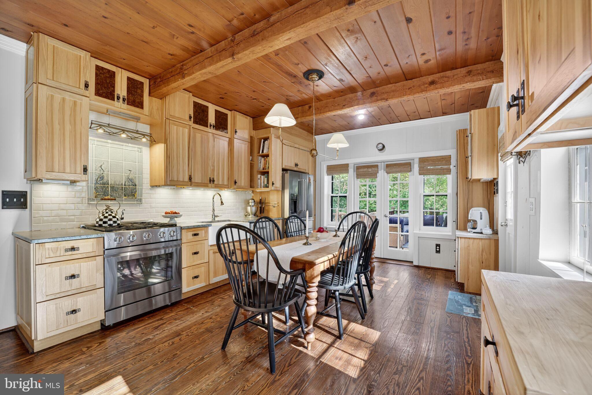 168 Green Street Annapolis, MD 21401 - Photo 11 of 40 a view of a dining room with furniture window and wooden floor
