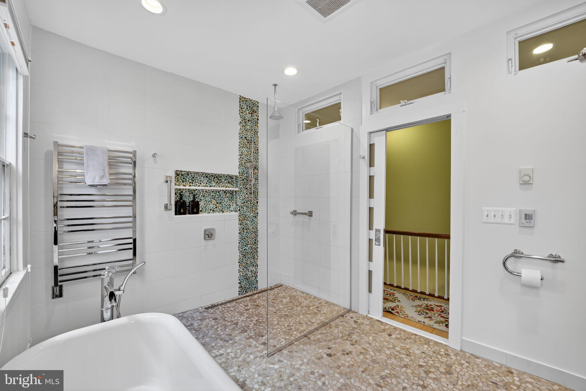 168 Green Street Annapolis, MD 21401 - Photo 23 of 40 a bathroom with a granite countertop sink and a mirror
