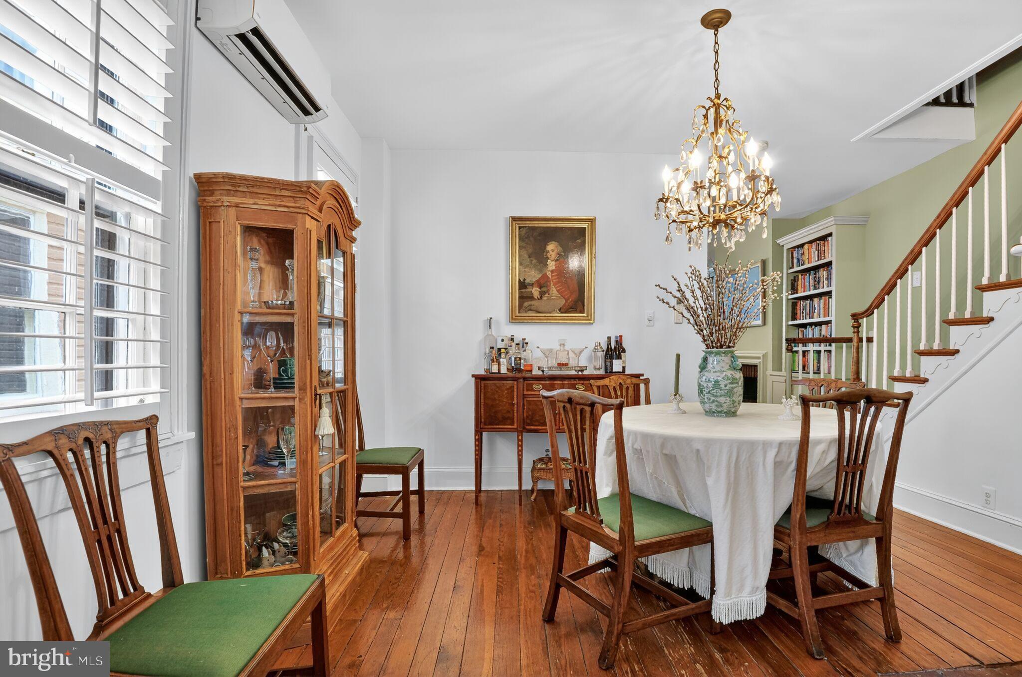 168 Green Street Annapolis, MD 21401 - Photo 9 of 40 a view of a dining room with furniture wooden floor and chandelier