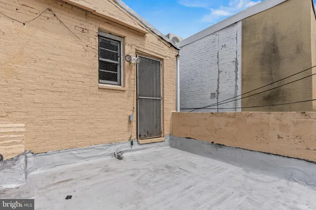 a view of entrance gate of an empty room