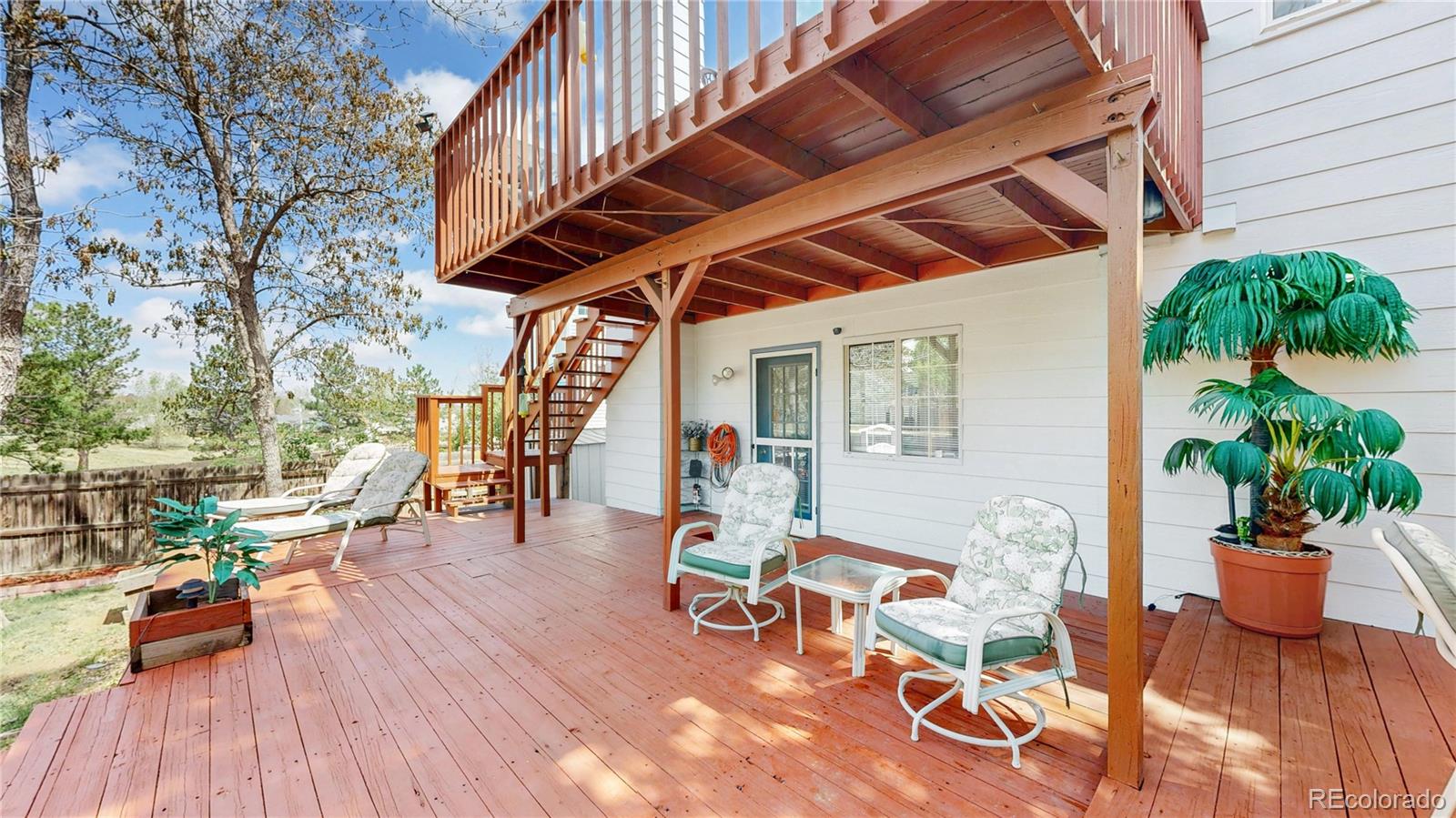3663 South Flanders Street Aurora, CO 80013 - Photo 23 of 31 a view of porch with seating space