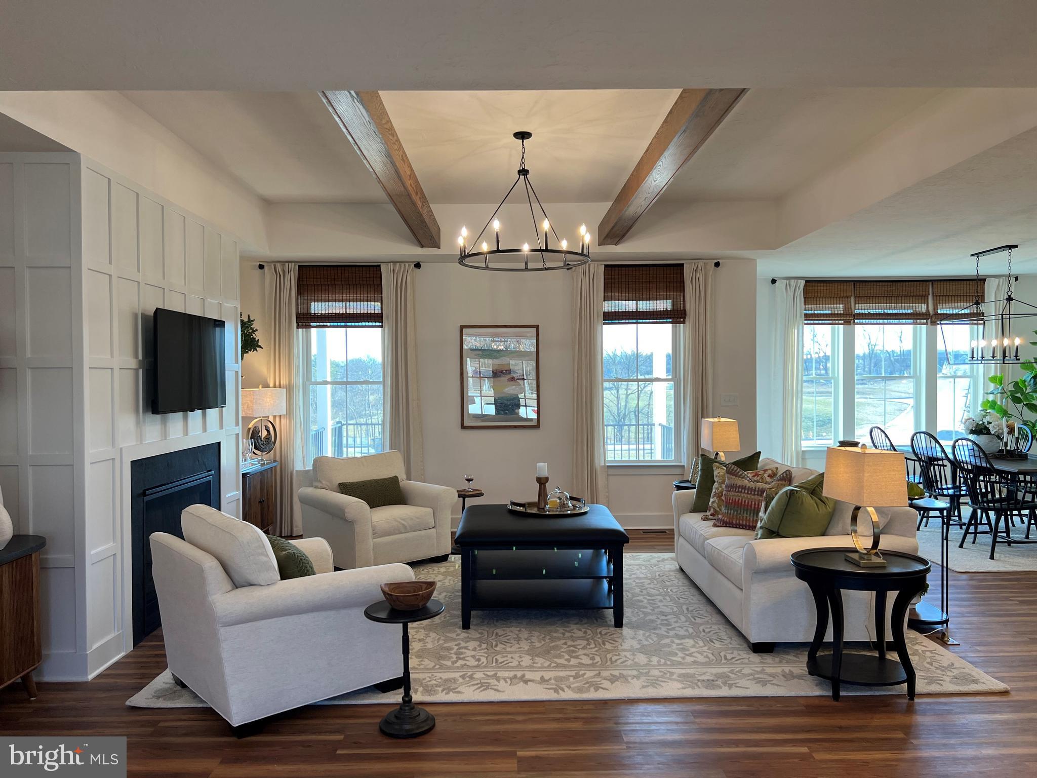 111 Onyx Drive, Unit 55 Hanover, PA 17331 - Photo 2 of 12 a living room with fireplace furniture and a flat screen tv