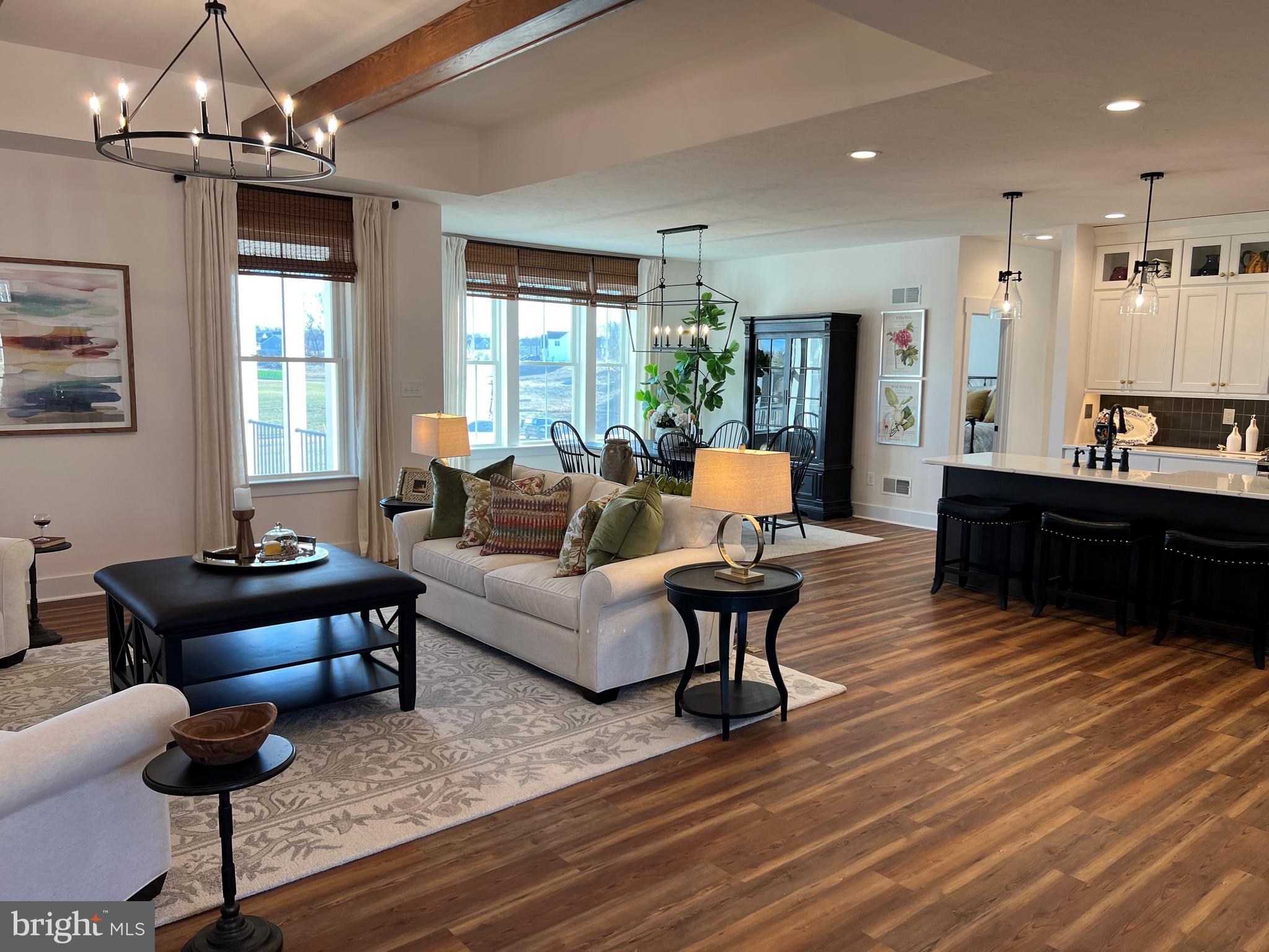111 Onyx Drive, Unit 55 Hanover, PA 17331 - Photo 3 of 12 a living room with furniture or chandelier and a wooden floor