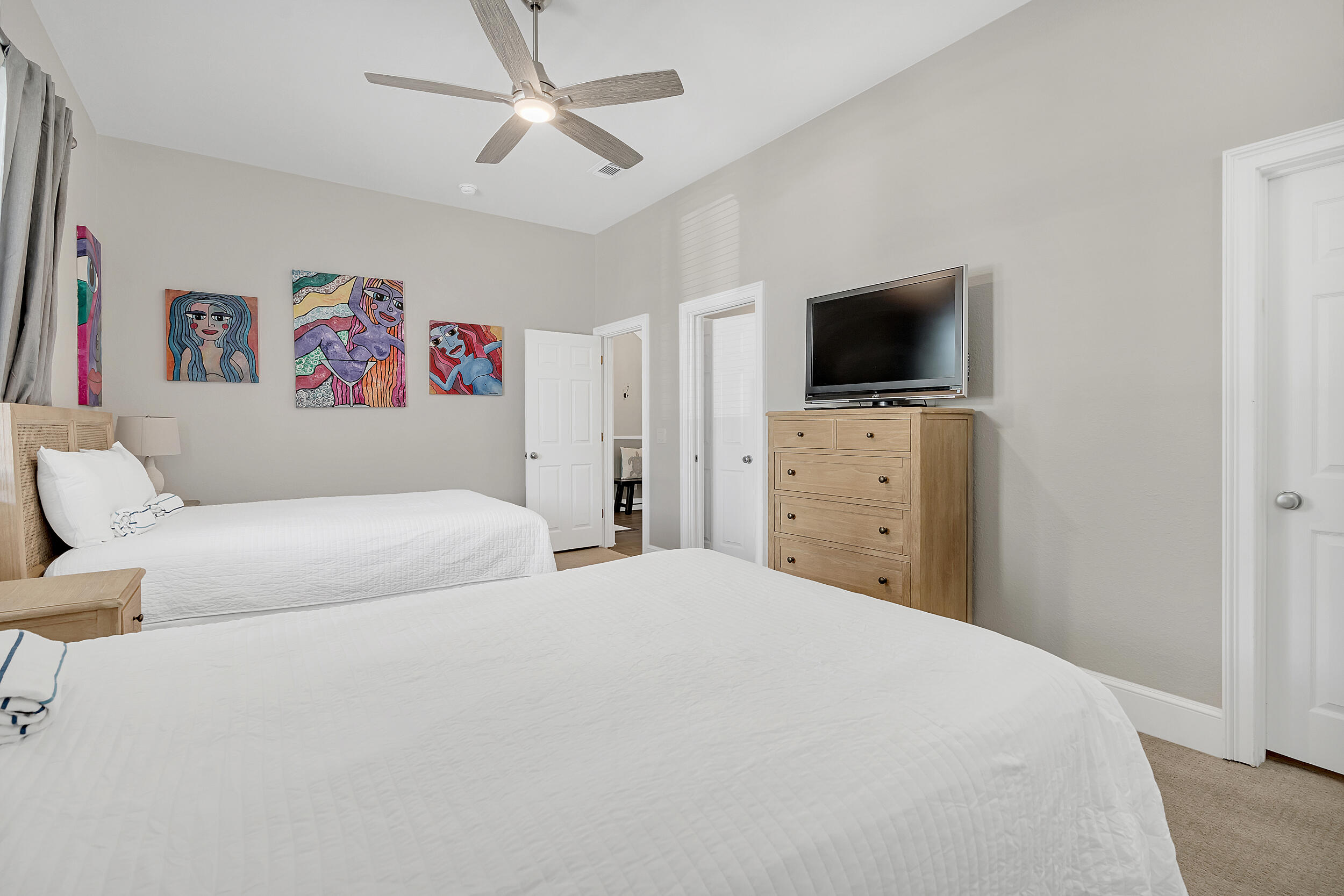 4482 Ocean View Drive Destin, FL 32541 - Photo 27 of 66 a bedroom with a bed and a flat screen tv