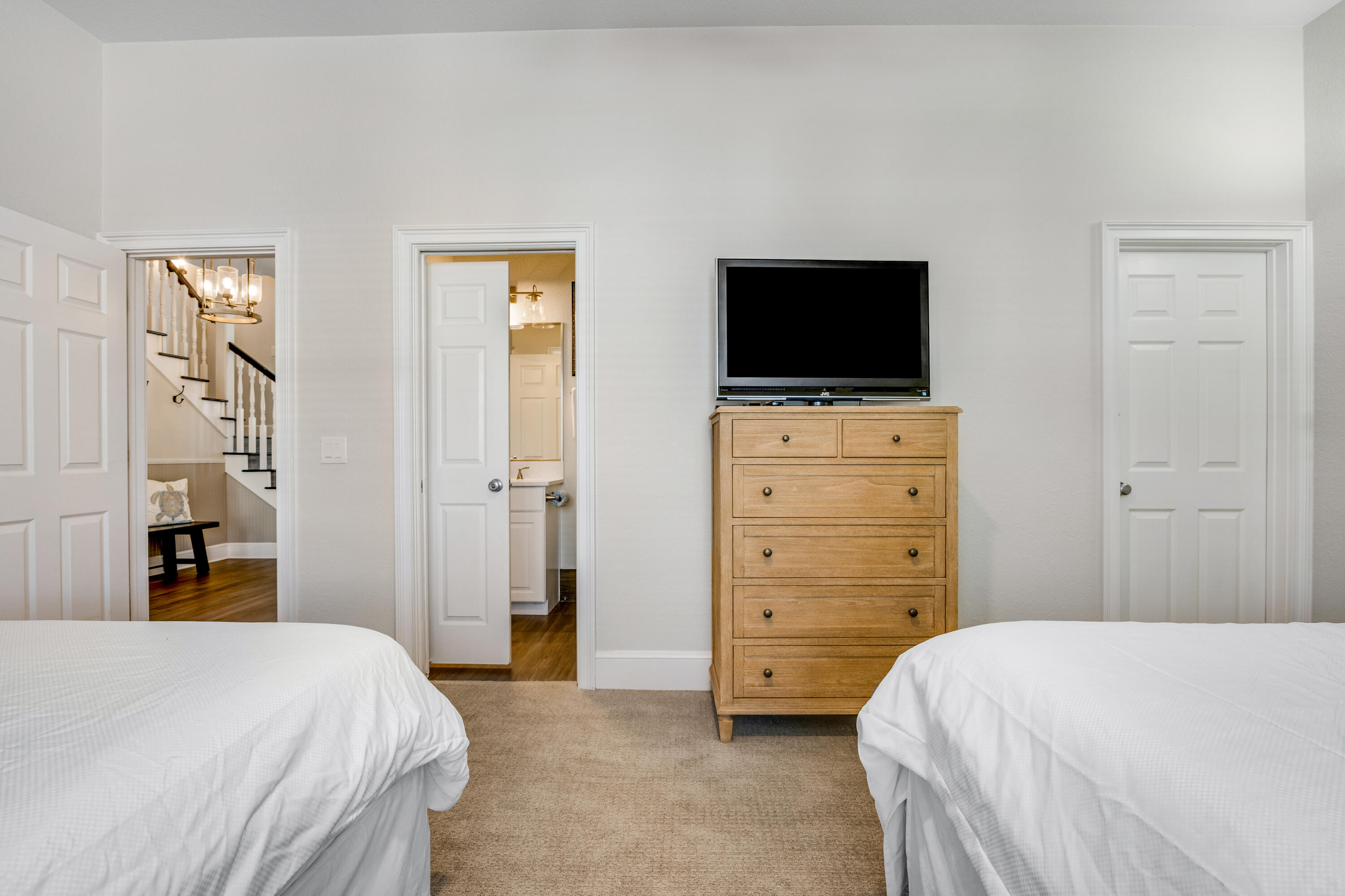 4482 Ocean View Drive Destin, FL 32541 - Photo 28 of 66 a bedroom with a bed and a television