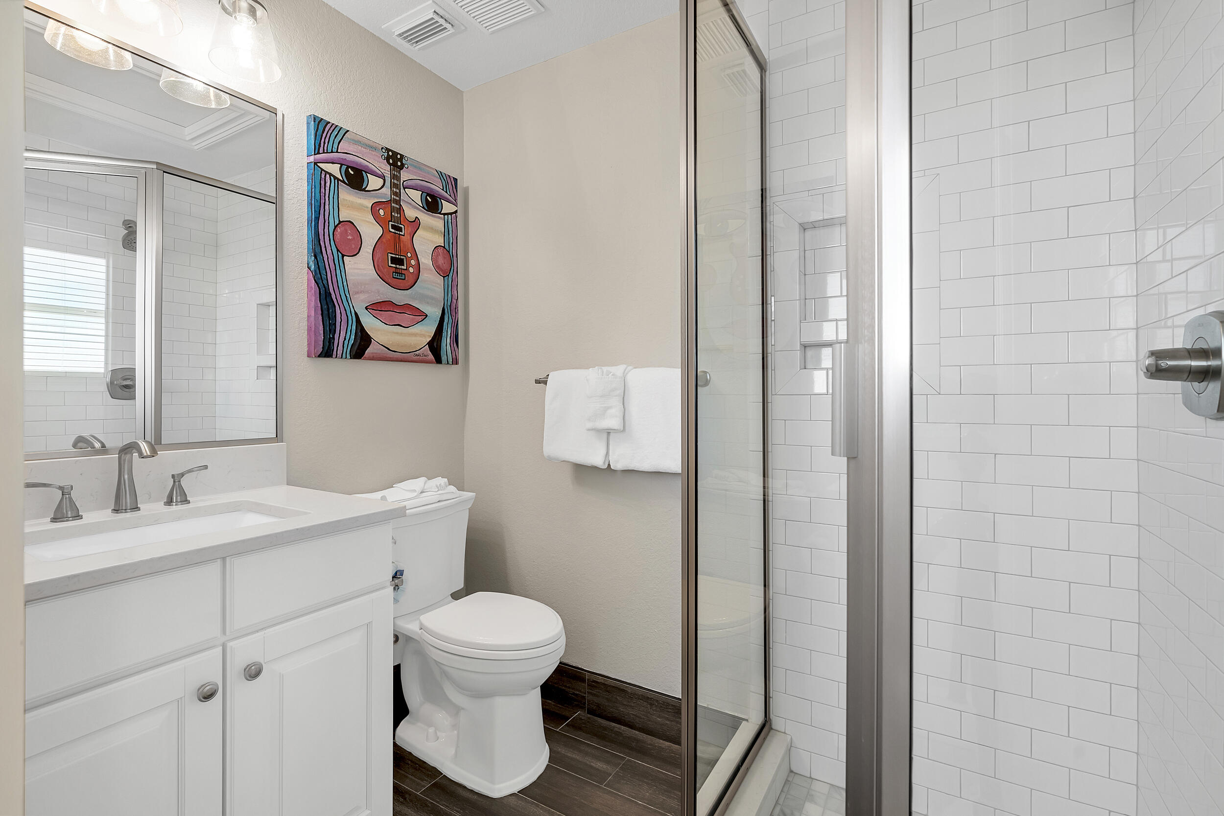 4482 Ocean View Drive Destin, FL 32541 - Photo 50 of 66 a bathroom with a toilet sink and vanity