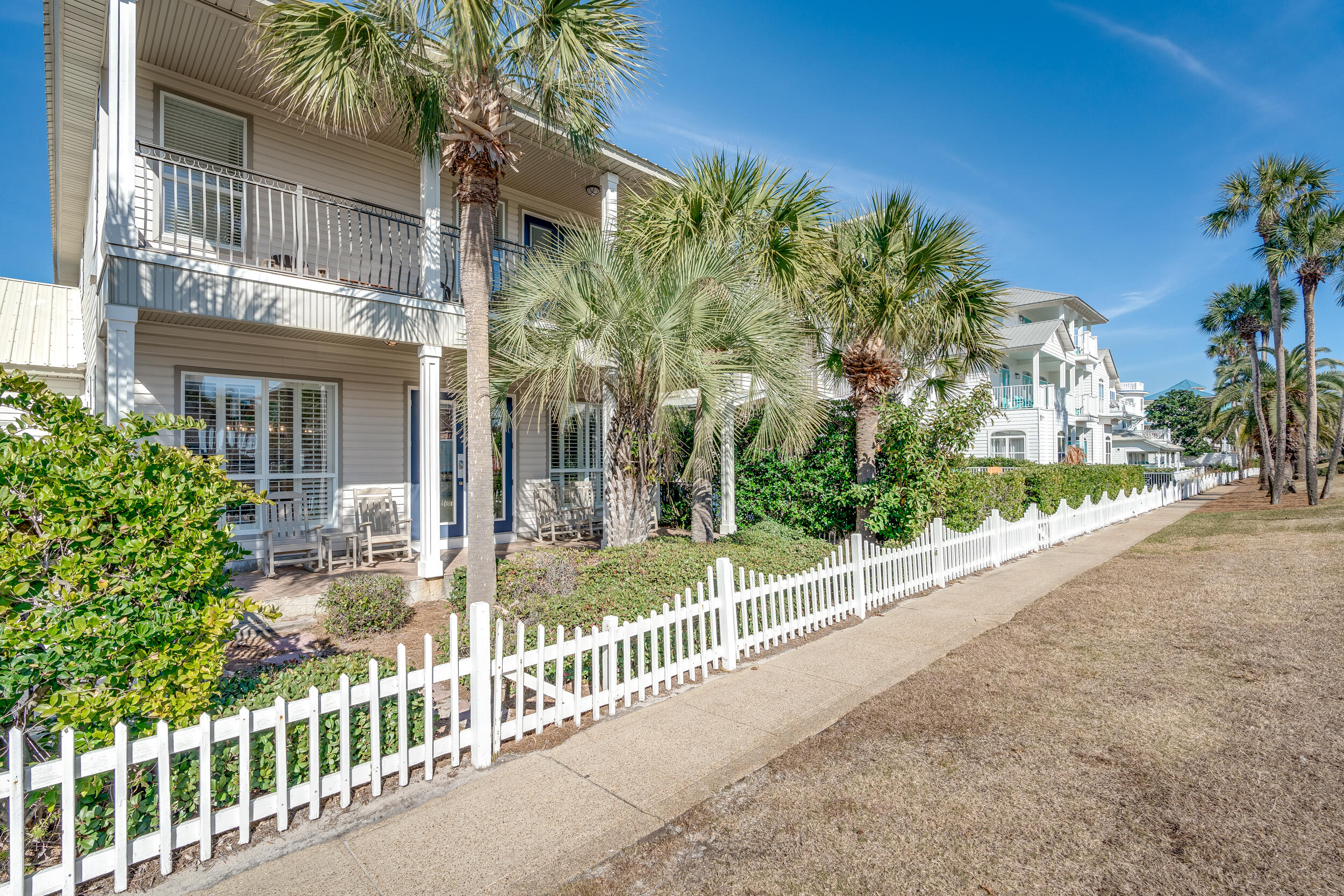 4482 Ocean View Drive Destin, FL 32541 - Photo 53 of 66 a view of a house with a small yard and plants
