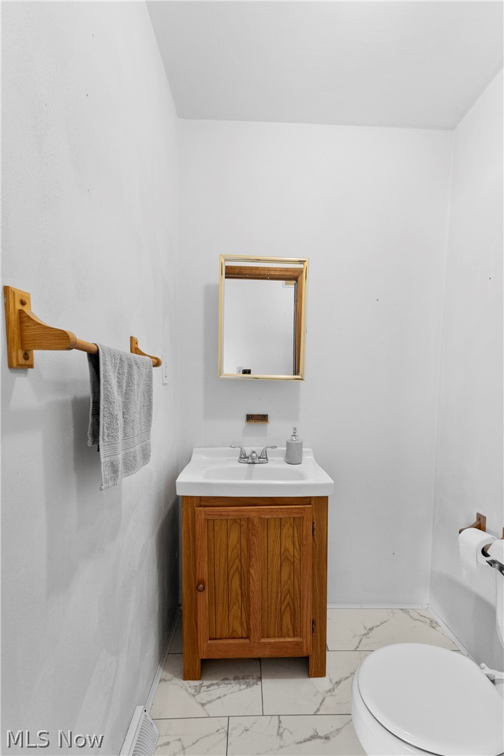 140 Iris Lane Colliers, WV 26035 - Photo 20 of 47 Bathroom featuring vanity and toilet