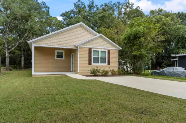 a view of a backyard of house