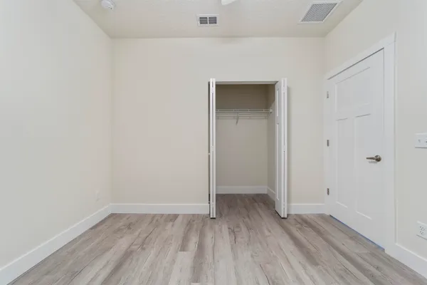 a view of small space with wooden floor