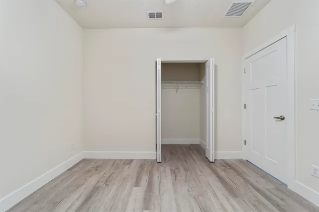 a view of small space with wooden floor