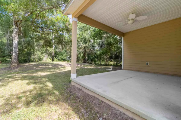 a view of a yard with porch
