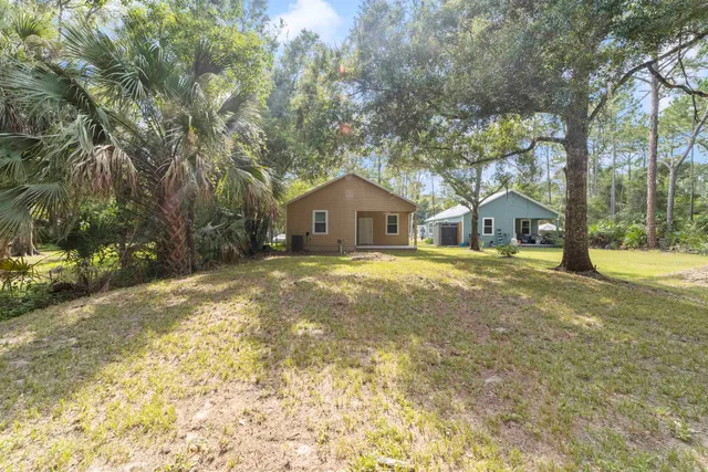 a house with trees in front of it