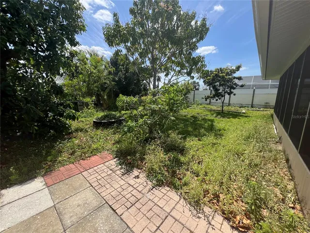 a garden view with a lake view