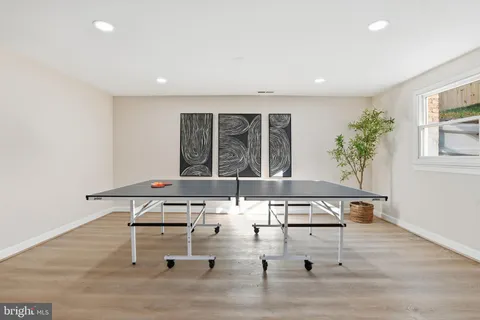 a view of a room with furniture and window