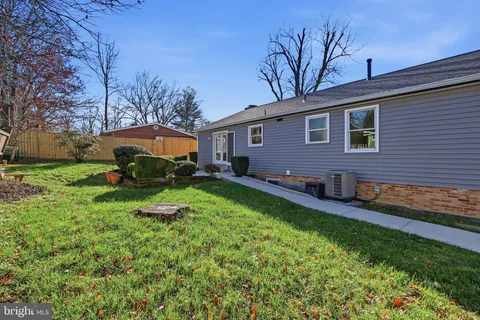 a house view with a garden space