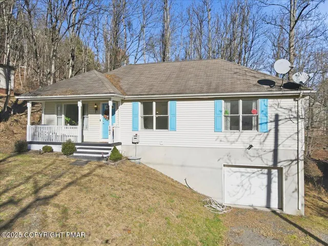 a view of a house with a small porch