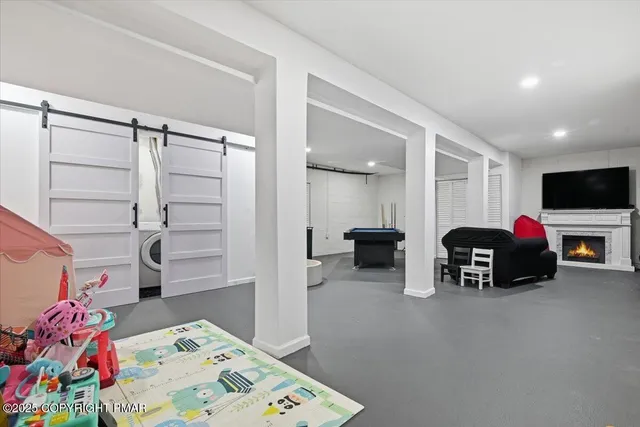 a room with furniture and a window