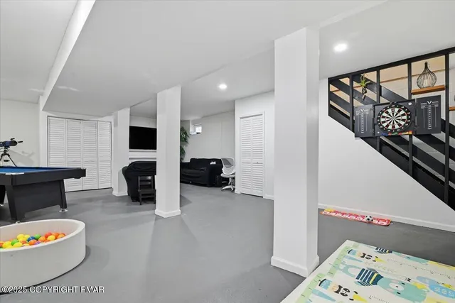 a view of a two chairs and table in the balcony