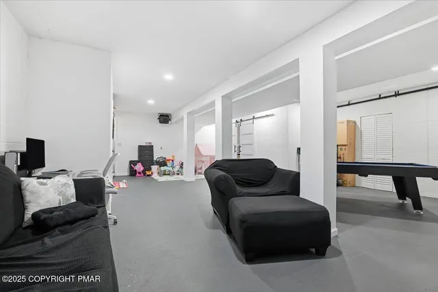 a view of a chairs and table on the deck