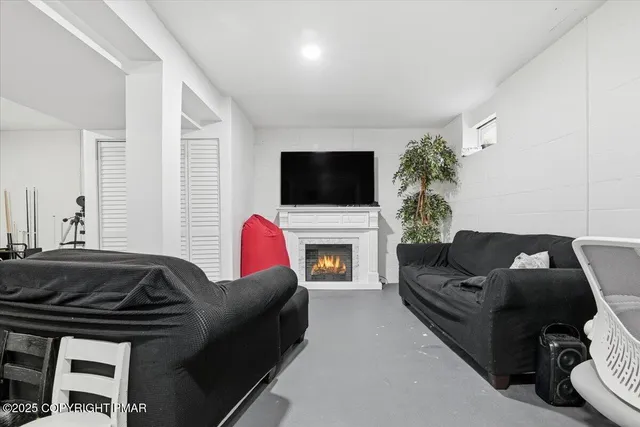 a view of balcony with wooden fencing