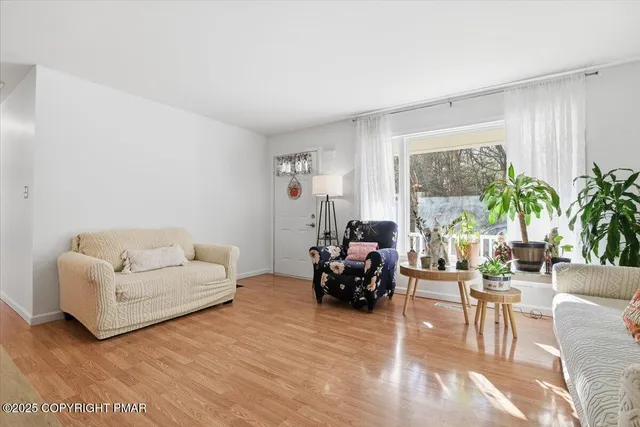 a kitchen with stainless steel appliances granite countertop a refrigerator stove and microwave