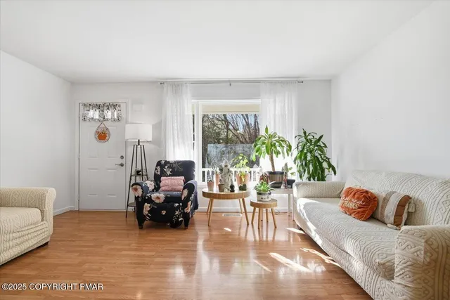 a kitchen with stainless steel appliances granite countertop a stove a refrigerator and a sink