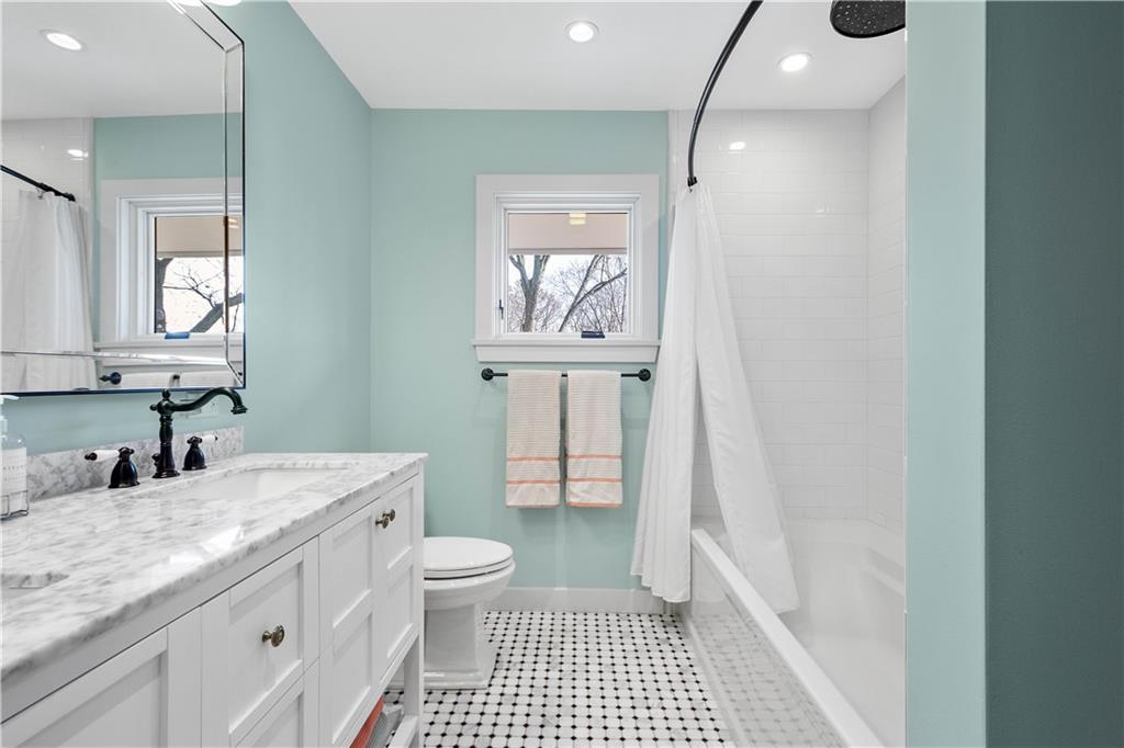 167 South McCoy Pl Road Sewickley, PA 15143 - Photo 24 of 38 Marble Topped Double Bowl Vanity and Tub/Shower with a Rainfall Ceiling Showerhead