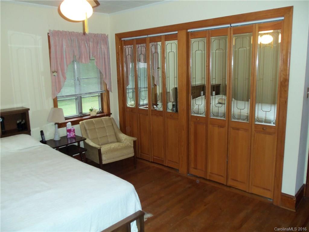 1216 Tom Helms Road Monroe, NC 28110 - Photo 14 of 23 a bedroom with a bed and a window