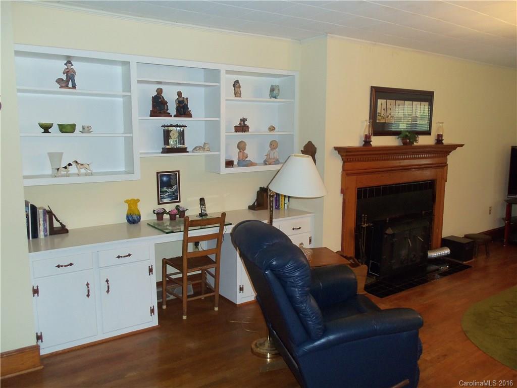 1216 Tom Helms Road Monroe, NC 28110 - Photo 4 of 23 a living room with furniture and a fireplace